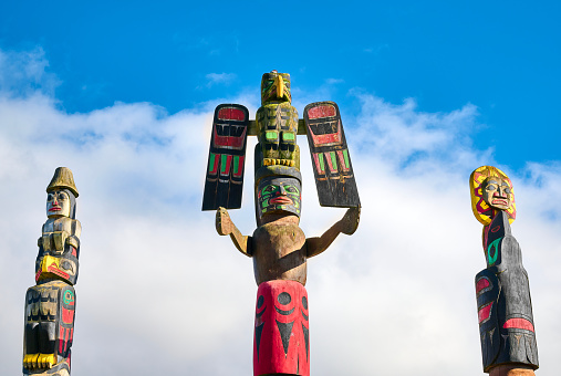 Sunshine Coast, British Columbia, Canada - February 16, 2022. District of Sechelt. First Nations totem pole, carvings by Northwest Coast First Peoples.