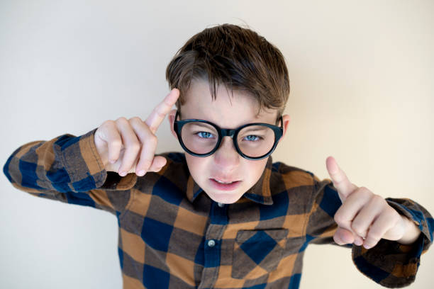 istock cool young boy wearing black glasses 1707969477