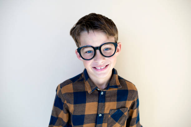 istock cool young boy wearing black glasses 1707970869