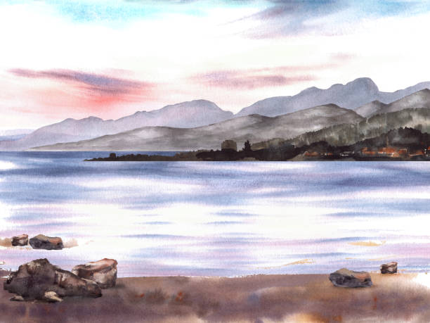 istock Watercolor Seascape sunset with mountains silhouettes and sandy shore with stones Hand drawn 1707987575