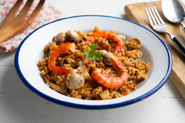 istock Spanish seafood paella with red shrimp and clams. 1708001046