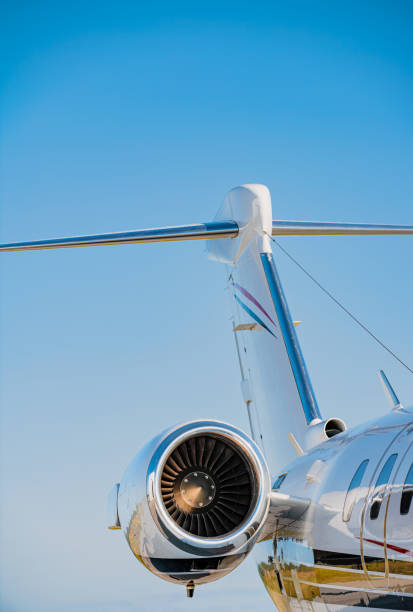 istock Tail fin, jet engine and fuselage of a small jet. 1708009712