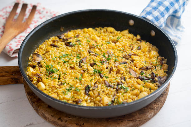 istock Rice paella with fish and cuttlefish, traditional Spanish recipe. 1708014929