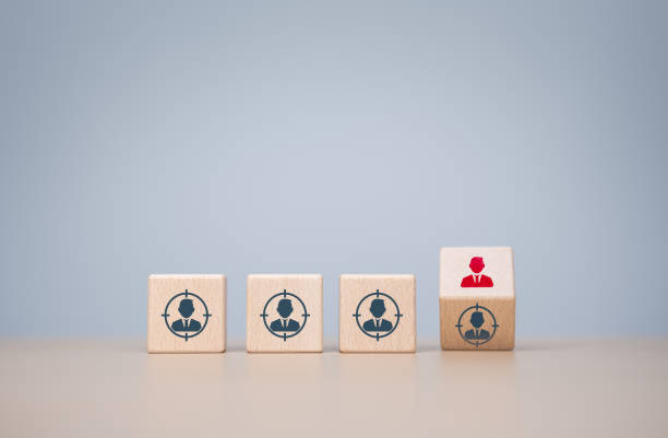istock Target client, Buyer individual person, Customer segmentation, Job recruitment concept. Specific buyer marketing, customer base strategies. Flipping wooden cubes to focus on target customer icons. 1708047855