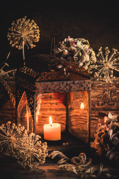 istock Lantern and dried hydrangea flowers on rustic wooden background 1708061315