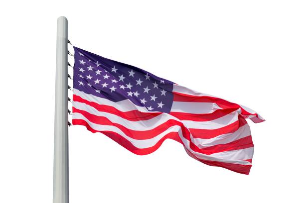 istock Large U.S. Flag blowing in a strong wind on a white background. 1708092647