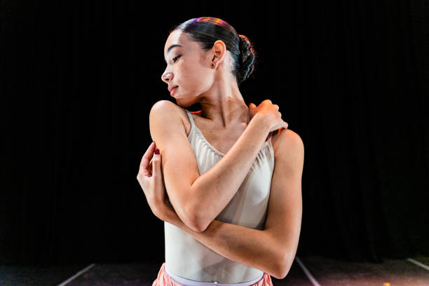 istock Young ballerinas dancing on a stage theater 1708096768