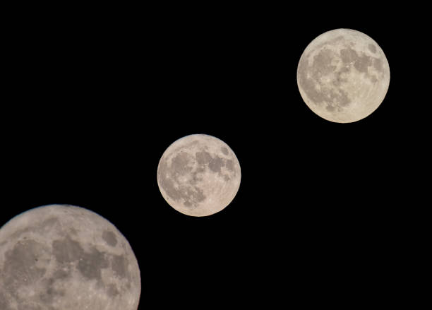 istock Captivating Abstract Moon Photography: Triple Lunar Elegance 1708112318