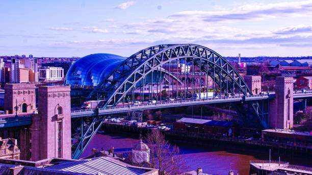 istock Picturesque stone bridge with arches spans a tranquil river: Tyne Bridge 1708140819