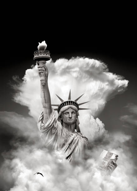 istock Conceptual Statue of liberty and dramatic stormy sky 1708141345