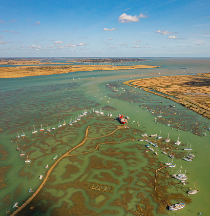 Aerial photo from a drone of Tollesbury with Mersea Island on the horizon.