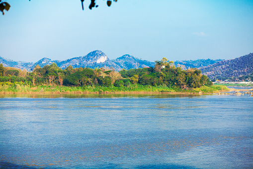 View downstream Mekong river to Mountains in Laos