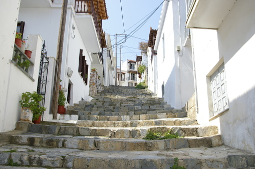 Alley with lot of stairs in the island of Skopelos