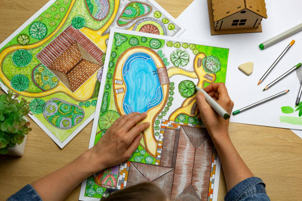 istock Landscape designer draws a sketch on paper. Layout. 1708194927