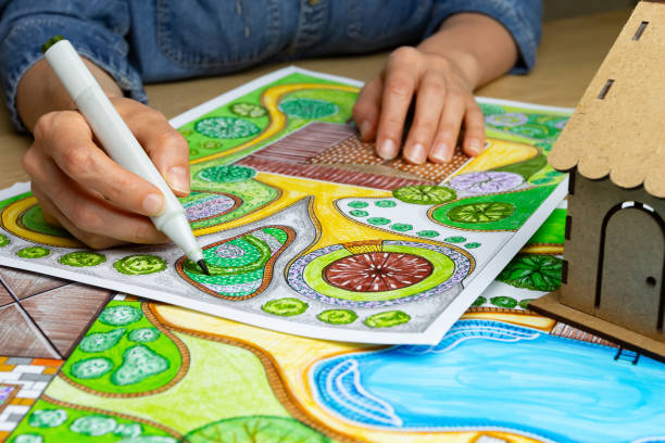 istock Landscape designer draws a sketch on paper. Layout. 1708194941