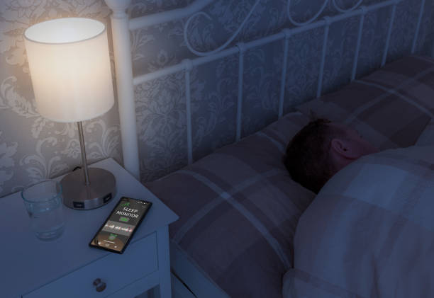 istock Man asleep in bed with smartphone 1708213922