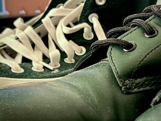 istock Green boots and shoelaces 1708214490