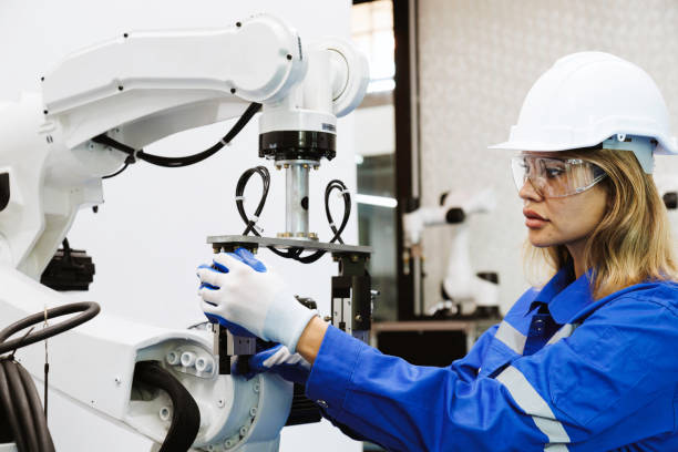 istock female automation machine engineer student study and inspection control robot arm machine in university or factory workshop. ai robot technology new innovation trend of manufacturing in industry 5.0 1708215049