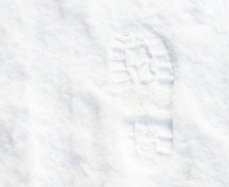 Proof that Santa has visited - a boot print in freshly fallen snow.