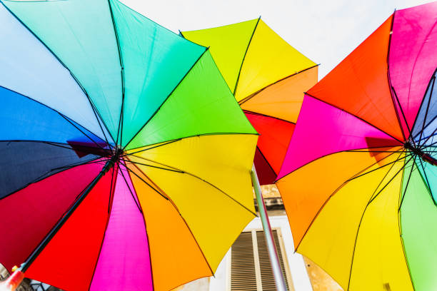 istock Colorful umbrellas to use as a background in bright and cheerful ideas. 1708272231