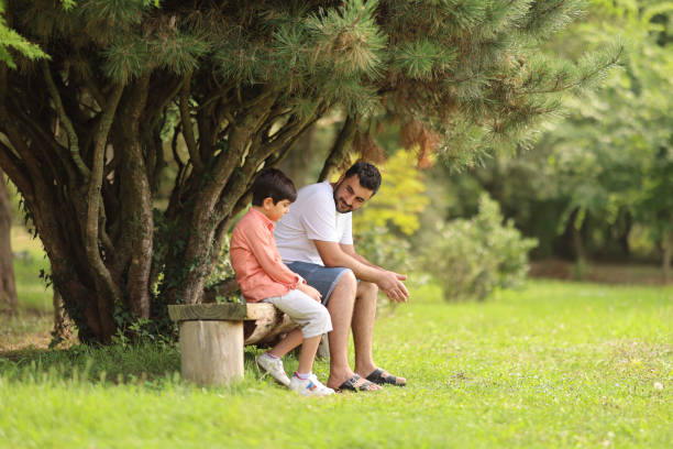 istock Father and son spending time outside in nature 1708273866