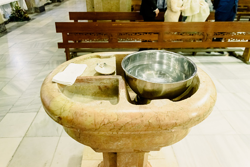 Baptismal font in a catholic church.
