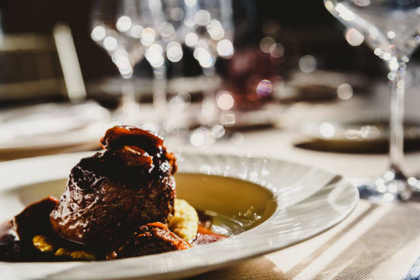 istock Exquisite veal dish with sauce served in luxury cutlery 1708304298