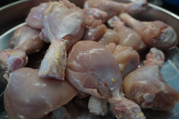 istock Preparing food with chicken thighs. 1708306389