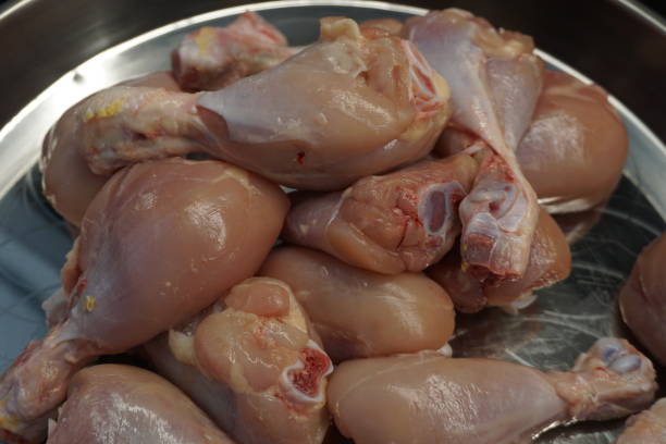 istock Preparing food with chicken thighs. 1708306696