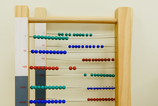 Wooden abacus in a Montessori classroom.