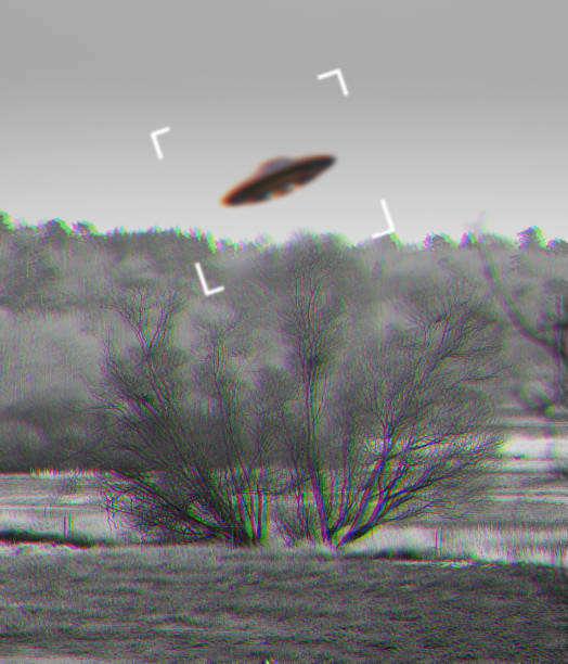 UFO, alien and camcorder on a camera screen to record a flying saucer in the sky over area 51. Viewfinder, motion blur and conspiracy with a spaceship on a recording device display outdoor in nature ovni, alienígena y videocámara en la pantalla de una cámara para grabar un platillo volador en el cielo sobre el área 51. visor, desenfoque de movimiento y conspiración con una nave espacial en un dispositivo de grabación que se muestra al aire libre