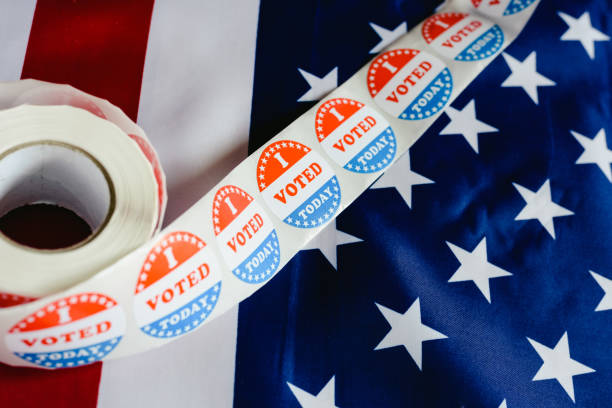 istock I voted today sticker, typical of US elections on American flag. 1708321675