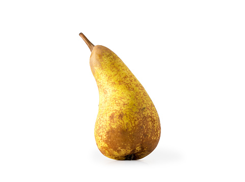 A ripe yellow pear isolated on white