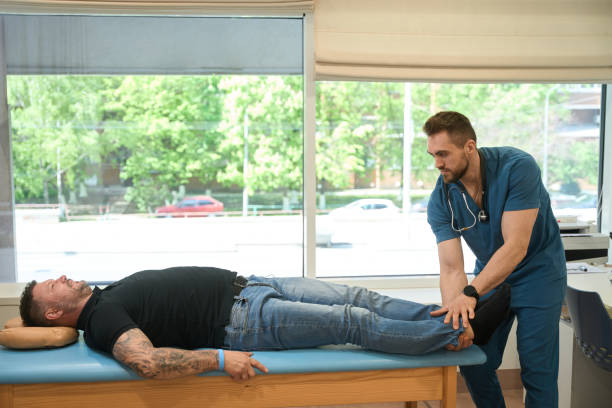istock Physical therapist assessing lower extremity muscle strength in patient 1708341362