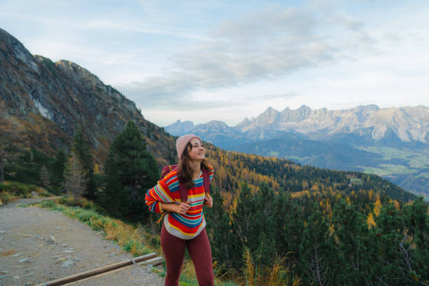 istock Woman hiking  in Austrian Alps  in autumn 1708358884
