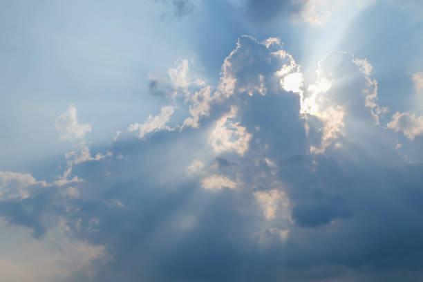 istock Low Angle View Of Clouds In Sky. Epic storm cloudscape. Soft sunlight, sun rays. Clear blue sky. Natural pattern, texture, background, wallpaper, 3D, graphic resources, design, copy space 1708364420