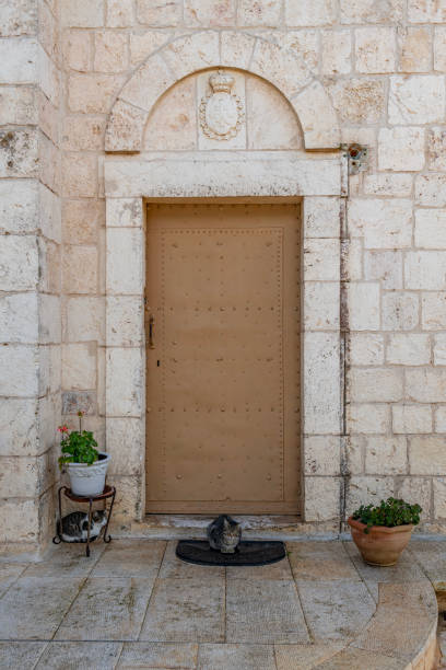 Door and two windows of one of the rooms surrounding the main yard of the citadel of Alexandria, Egypt