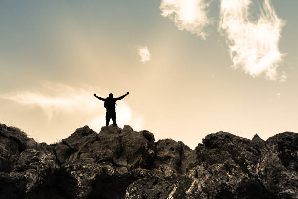 istock Healthy active lifestyle. Men on the mountain top. 1708404379