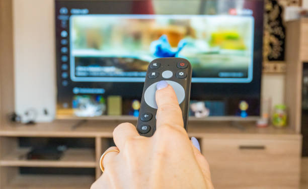 istock Changing channels and looking for a movie to watch 1708411864