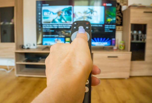 istock Changing channels and looking for a movie to watch 1708411869