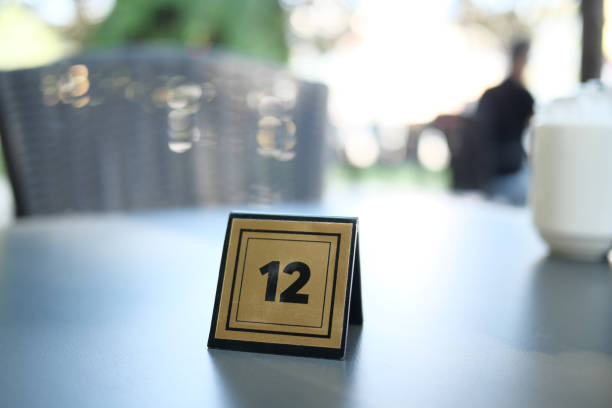 Number sign on restaurant table to show reservation.