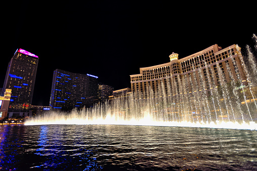 Fountains of Bellagio is a free attraction at the Bellagio resort, located on the Las Vegas Strip in Paradise, Nevada. It consists of a musical fountain show performed in an 8.5-acre man-made lake in front of the resort.