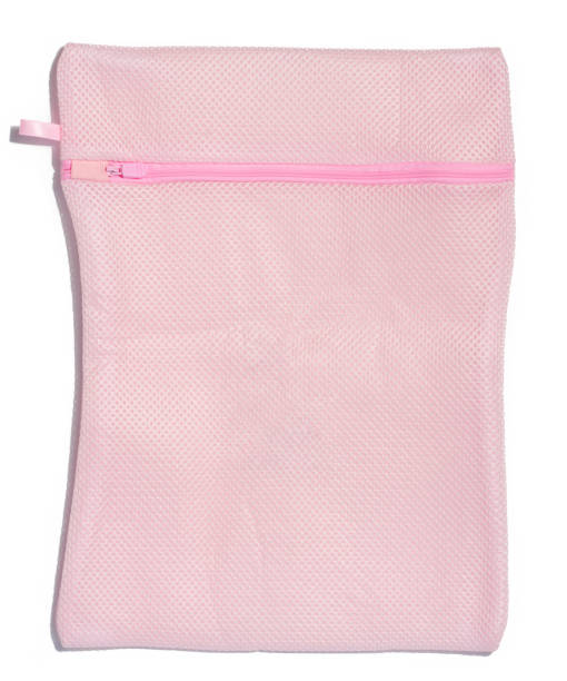 istock Pink bag for washing clothes in a washing machine on a white background 1708466672
