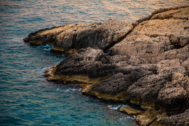 istock Sea and rocky landscape at sunset time 1708555368