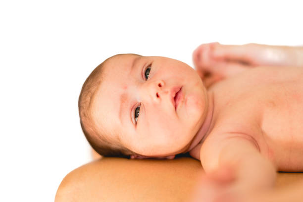 Newborn baby thinking relaxed.