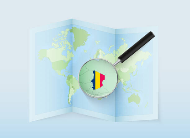 istock A folded world map with a magnifying lens pointing towards Chad. Map and flag of Italy in loupe. 1708631762