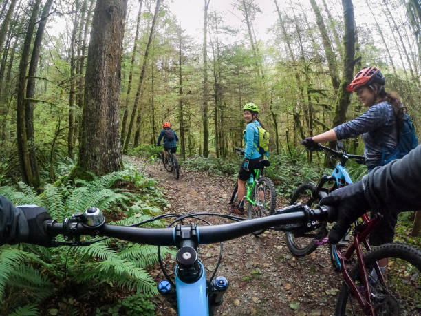 istock POV, Multi-Generation, Multiracial Group of Mountain Bikers on Forest Trail 1708645575