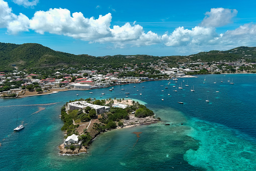 View to the port and lagoon with  anchored yachts at Carriacou island, Grenada, Caribbean sea