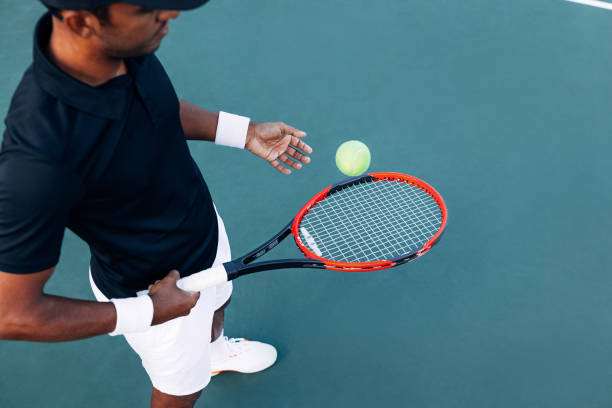 istock High angle of an unrecognizable tennis player bouncing a ball with a racket 1708698900