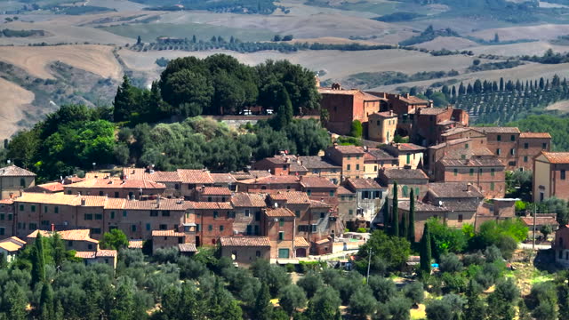 City of chiusure in the tuscany region of italy, Aerial view of chiusure, Aerial view of italian tuscany from the air, A village that is a frazione of the commune of Asciano in the province of Siena